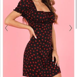 LOCAL CELEBRITY DRESS IN BLACK WITH HEART PRINT